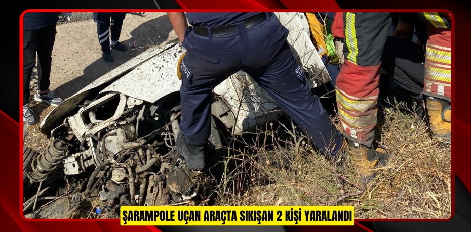 Şarampole uçan araçta sıkışan 2 kişi yaralandı