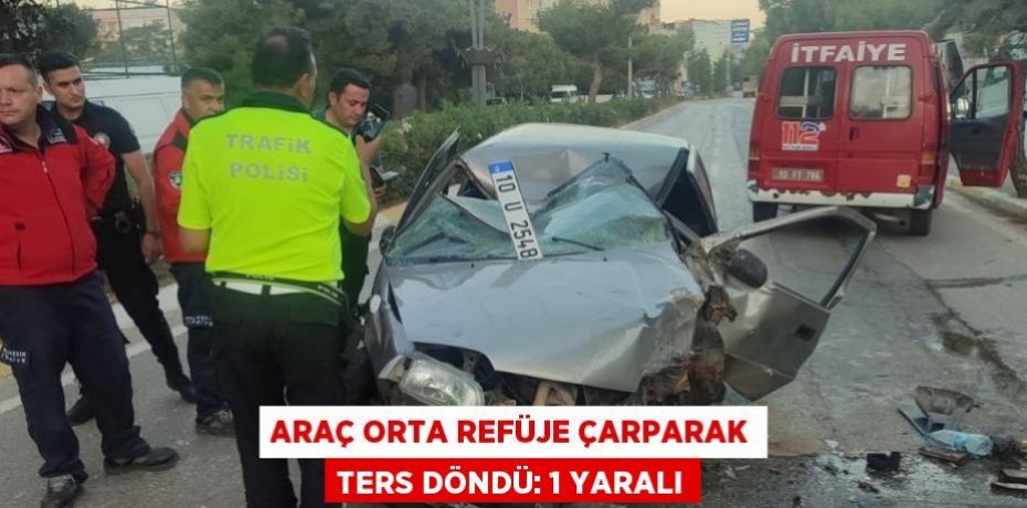 Araç orta refüje çarparak ters döndü: 1 yaralı