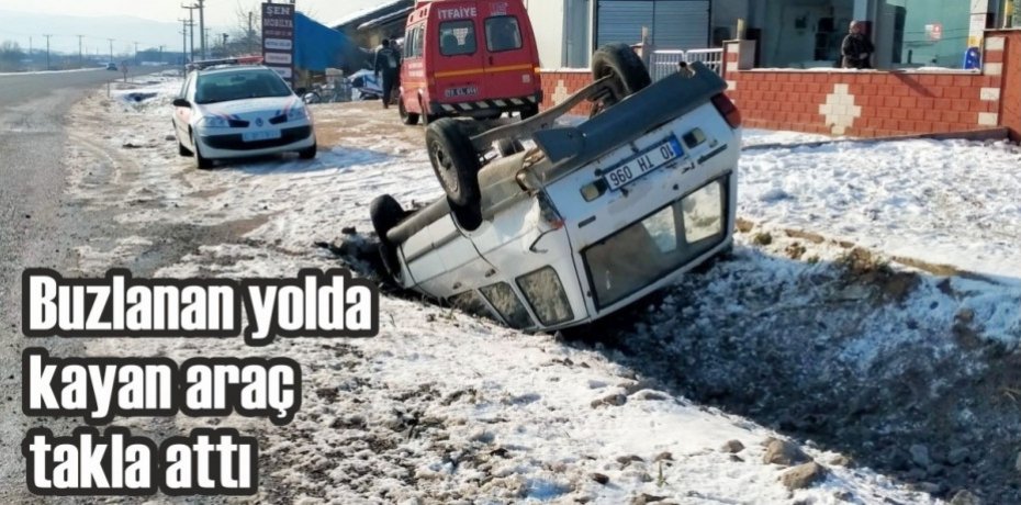 Buzlanan yolda kayan araç takla attı